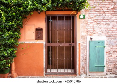 Colorful Front Door Of An Italian House.