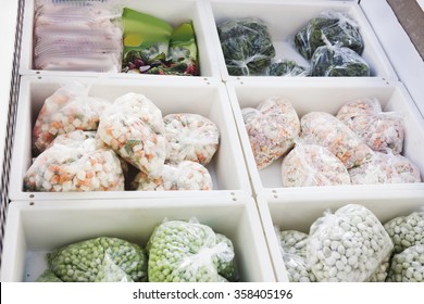 Colorful Frozen Vegetables In A Supermarket In The Refrigerator