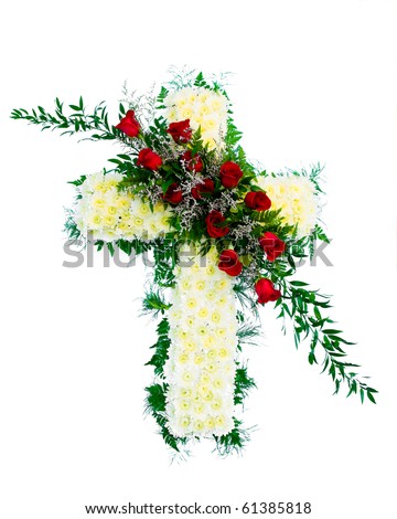 Colorful funeral flower arrangement with Cross design.