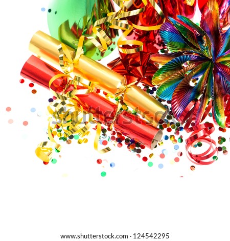 colorful garlands, streamer, cracker, party hats and confetti. festive decoration background