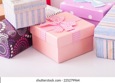 Colorful Gift Box On White Table. 