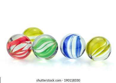 Colorful glass marbles isolated on white background