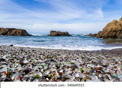 Colorful Glass Pebbles Blanket This Beach In Fort Bragg, California, Photo Taken Mid Day To Get Bright Color In The Rocks And Water