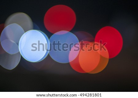 colorful glowing bokeh light with black background