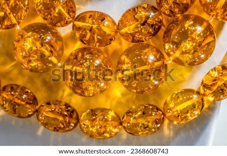 Colorful Golden Baltic Amber Succinite Necklaces Jewelry Main Square Gdansk Poland. Amber Capitol of World. Amber 40 million years old. Found Gdansk Beaches 6000 years. Plant pollen in Amber.