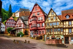 Colorful Gothic Style Half-timbered Houses In Historical Old Town Of Miltenberg, Bavaria, Germany. Miltenberg Is A Popular Travel Destination Near Frankfurt Am Main, Germany.