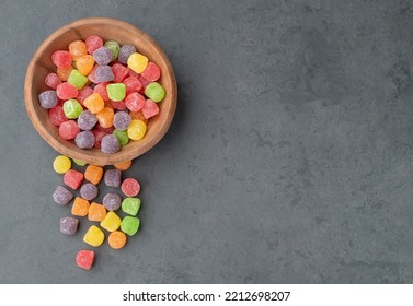 Colorful Gum Drop Candies Over Stone Background With Copy Space.