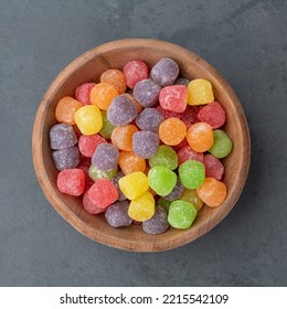 Colorful Gum Drop Candies Over Stone Background.