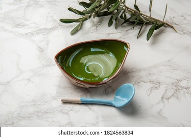 Colorful Handmade Ceramic Bowl And Spoon On Marble