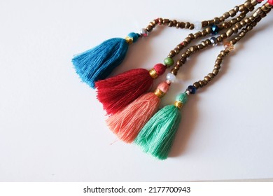 Colorful handmade tassels with beads as souvenir or gift to someone.