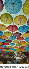 Colorful Hanging Umbrellas At The Theme Park