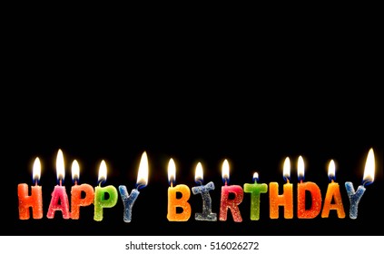 Colorful Of Happy Birthday Candle With Flame Lighting On The Black Screen