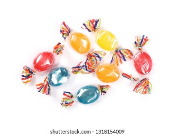 Colorful Hard Candies In Transparent Cellophane Wrapping, Isolated On White Background, Top View