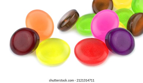 Colorful hard fruit candies isolated on white background
