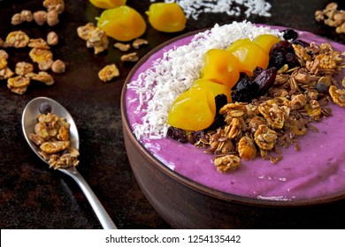 Colorful, Healthy Food. Acai Smoothie Bowl. Keto Breakfast Idea. Fruit Curd Smoothie, Granola, Fruit.