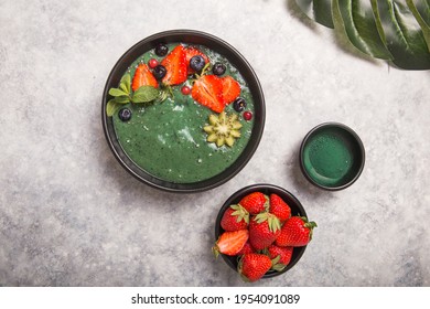 Colorful, Healthy Food. Acai Smoothie Bowl. Keto Breakfast Idea. Fruit Curd Smoothie, Acai. Breakfast With Green Spirulina, Strawberry, Chia, Kiwi In Black Plate