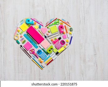 Colorful heart shape composed of stationery and office objects. - Powered by Shutterstock