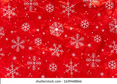Colorful holiday Christmas crumpled wrapping paper background.