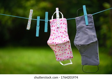 Colorful Homemade Mouthguards Made Of Colored Fabric Hang On An Outdoor Clothesline