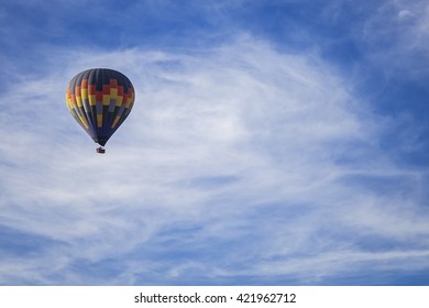 Colorful Hot Air Ballon Flying In The Sky. Sunny Weather, Blue And Cloudy Sky. (Namibia, South Africa)