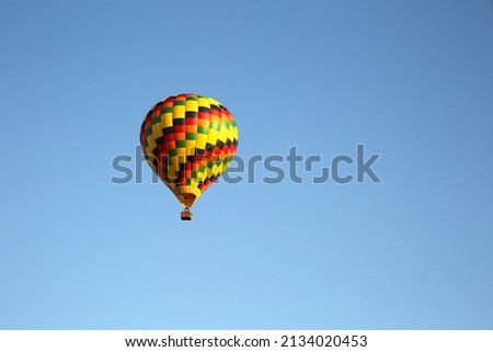 a colorful hot air balloon against blue sky at Lancaster balloon festival, Lancaster, Pennsylvania, USA