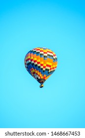 Colorful Hot Air Balloon Taking Off With Blue Sky