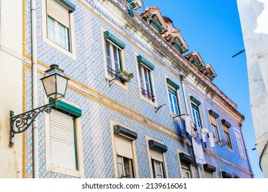 Colorful house covered with traditional portuguese tiles azulejos in central Lisbon in Portugal