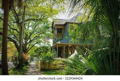 A Colorful House In Mobile, Alabama With Tropical Plants