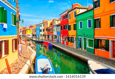 Colorful houses in Burano island near Venice, Veneto, Italy. Canals and streets of Burano. Most colorful traditional fishing town Burano, Italy. Architecture and landmarks of Burano, Venice and Italy