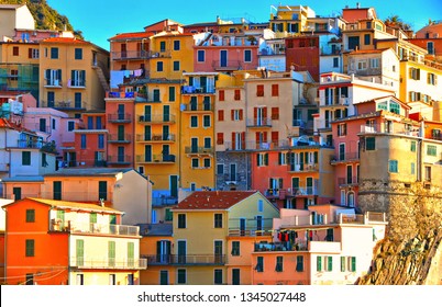  colorful houses and old facade in small village Manarola with mediterranean sea in background, Cinque terre, liguria , italy