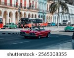 Colorful houses with retro cars in Havana in Cuba