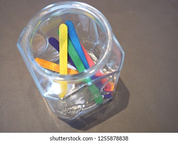 Colorful Ice Cream Stick In Glass Jar For Draw Lots.