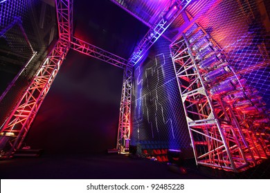 Colorful Illuminated Way With Grid To Boxing Ring Inside Fight Club; Many Lights