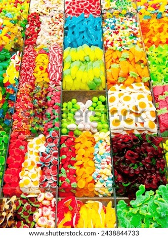Colorful image jellies of various sweets, candied fruit jelly at market stall