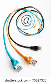 Colorful internet cables in a spiral formation with at symbol in centre symbolizing the internet or email sending, isolated on white background.