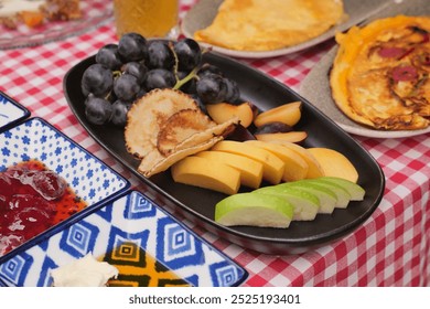 A Colorful and Inviting Fruit Platter Beautifully Displayed on a Picnic Table for All - Powered by Shutterstock