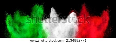colorful italian flag green white red color holi paint powder explosion isolated on black background. italia europe travel tourism concept