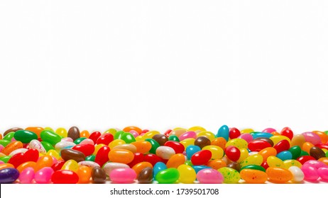 Colorful jelly beans isolated on white. Top view.  - Powered by Shutterstock
