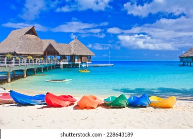 Colorful Kayaks On White Sand Beach, Bora Bora, French Polynesia, South Pacific  Concept For Relaxation, Vacation, Resort