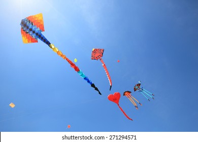 Colorful Kites In Blue Sky. 