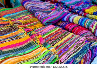 colorful knitted fabric - many multicolred shawls on the market