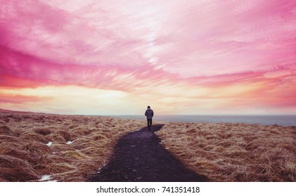 Colorful Landscaped, A Man Walking Alone On The Way Forward With Colorful Sky