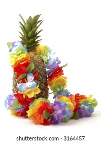 Colorful Lei Draped Over A Fresh Pineapple.