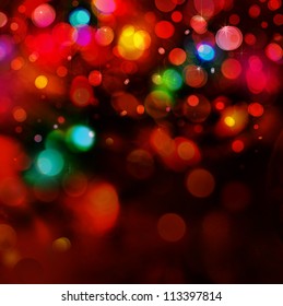 Colorful lights  on red background.