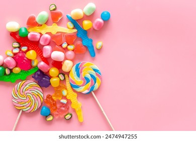 Colorful lollipops and different gummies jelly and candies, top view. - Powered by Shutterstock