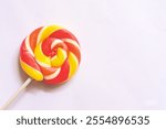 colorful lollipops, red and yellow lollipops isolated on white background