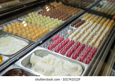 Colorful Macaron And Icecream Display In A Shop