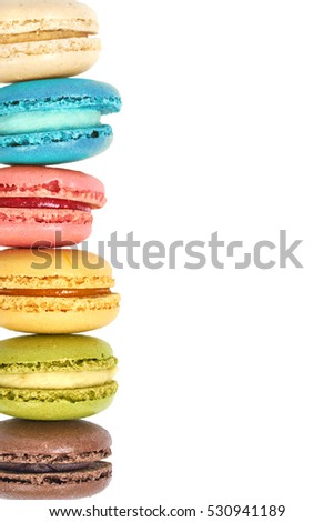 Colorful macarons on white background. Macaron or Macaroon is sweet meringue-based confection.                                      