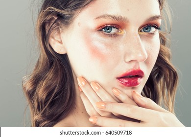 Colorful Make-up Woman Face, Beautiful Brunette Summer Makeup, Beauty Fashion Girl Model With Pink Lips. Gray Background.