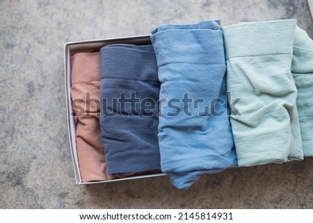 Colorful of man underwear in box. Top view